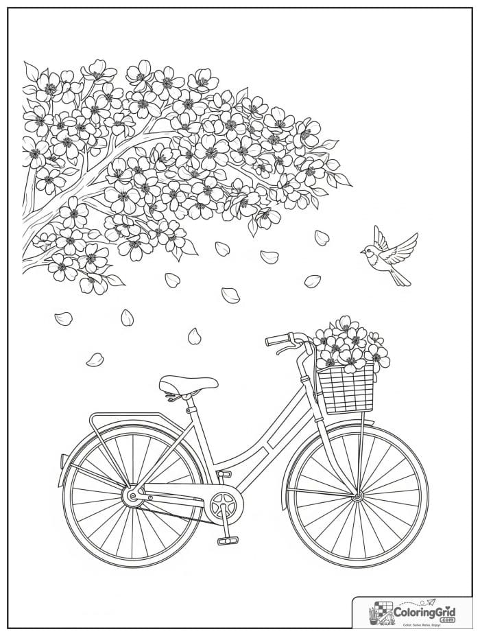 Bicycle parked under a blossoming tree in spring.