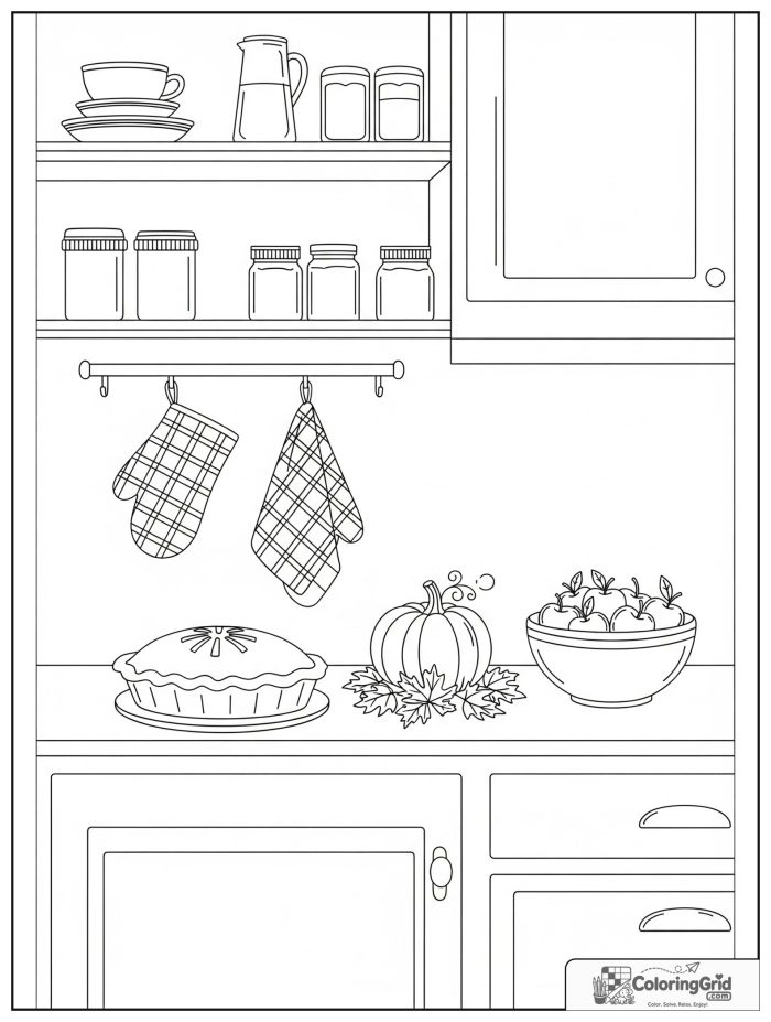 Cute and cozy fall kitchen with pie, apples, and pumpkins.